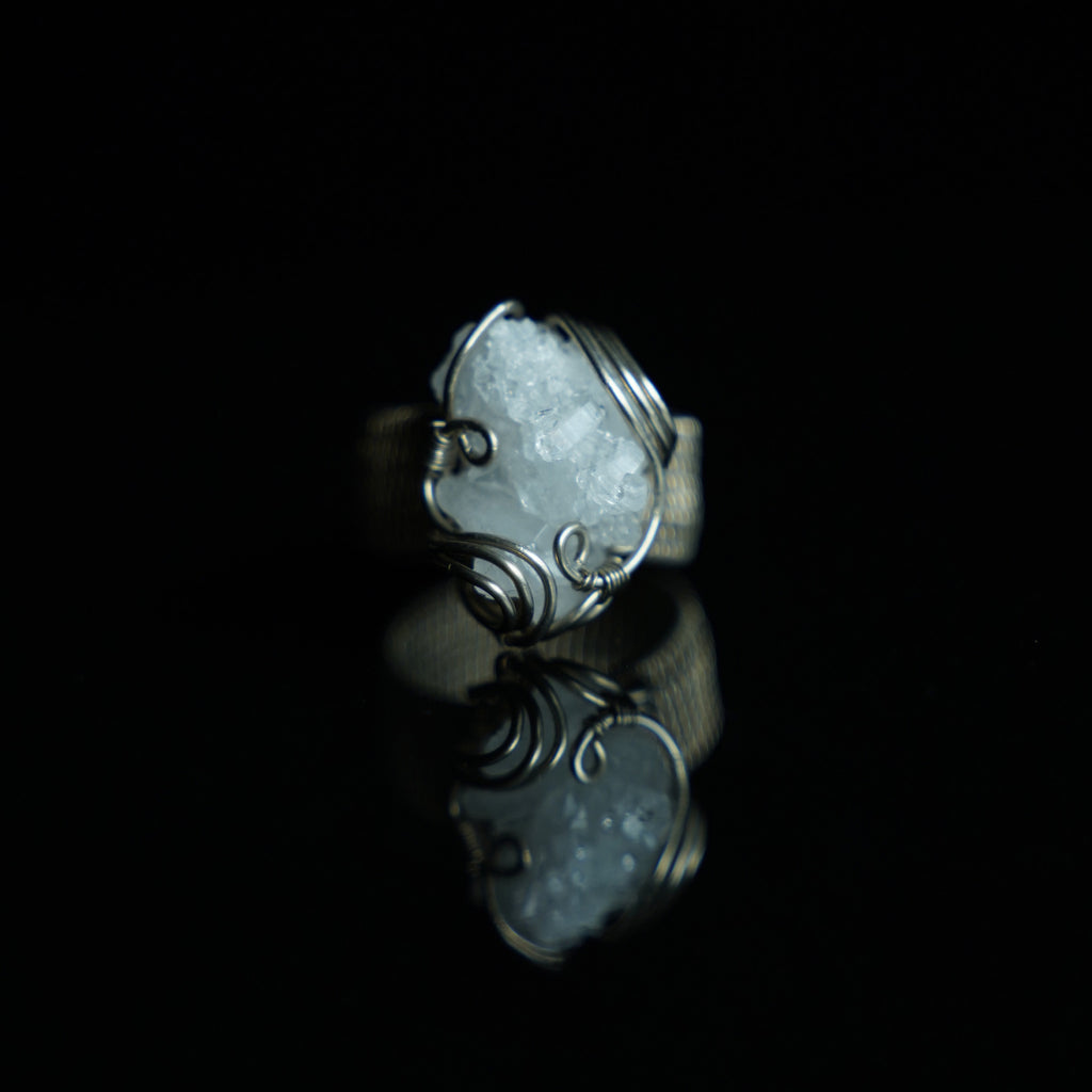 The Quiet Frost natural crystal cluster ring with hand-shaped white copper wirework, frontview