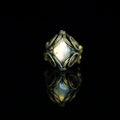 The Veil natural labradorite ring with hand-shaped brass wirework, front view